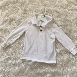 Lightly worn boy long sleeve white polo shirt.